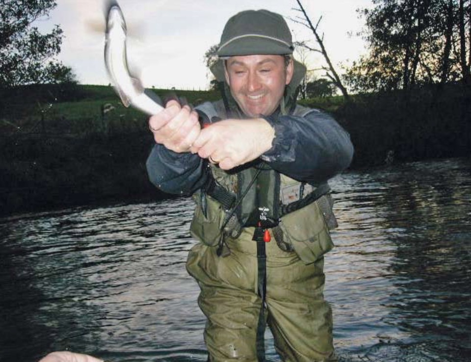 Andrew Bick catching a fly fish in full gear
(from our first Report in 2008)